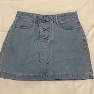 Kendall and Kylie tie up denim miniskirt